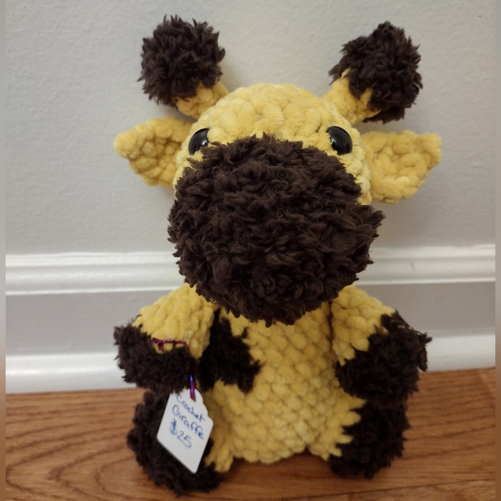 Crochet fuzzy yellow giraffe.
